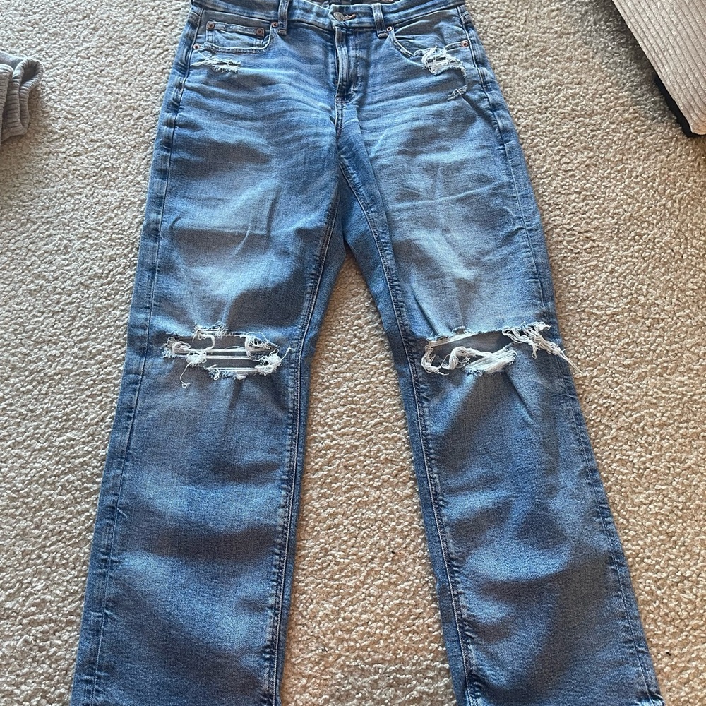 Distressed Blue Denim Jeans